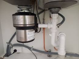 Plumber shaking hands with customer after completing work