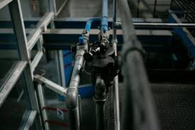 Plumber inspecting residential plumbing system